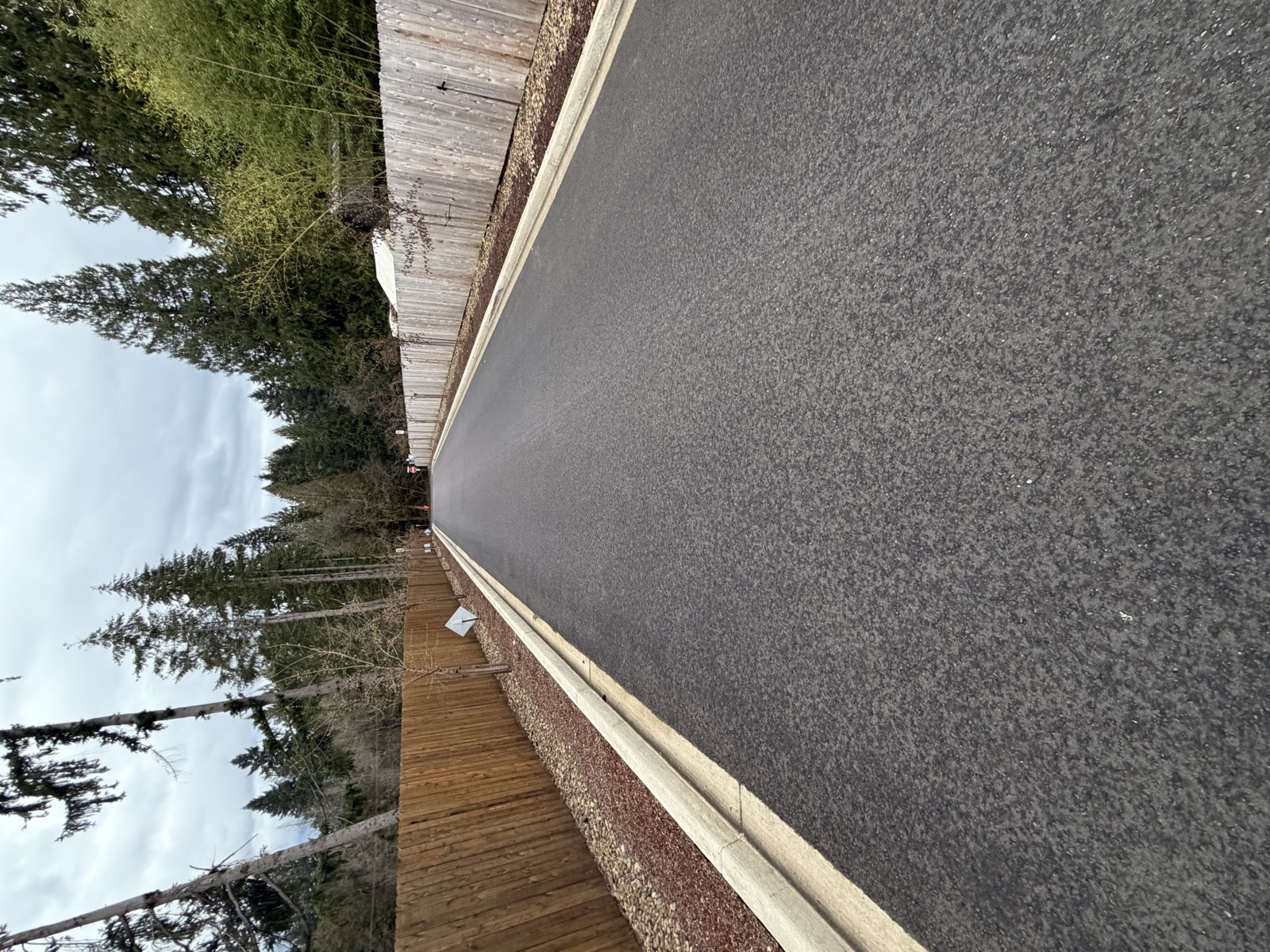 The entrance to Salmon Creek Reserve subdivision on NE 174th Street — no sidewalks, no street lights, no bike lanes